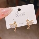 gold swan earrings